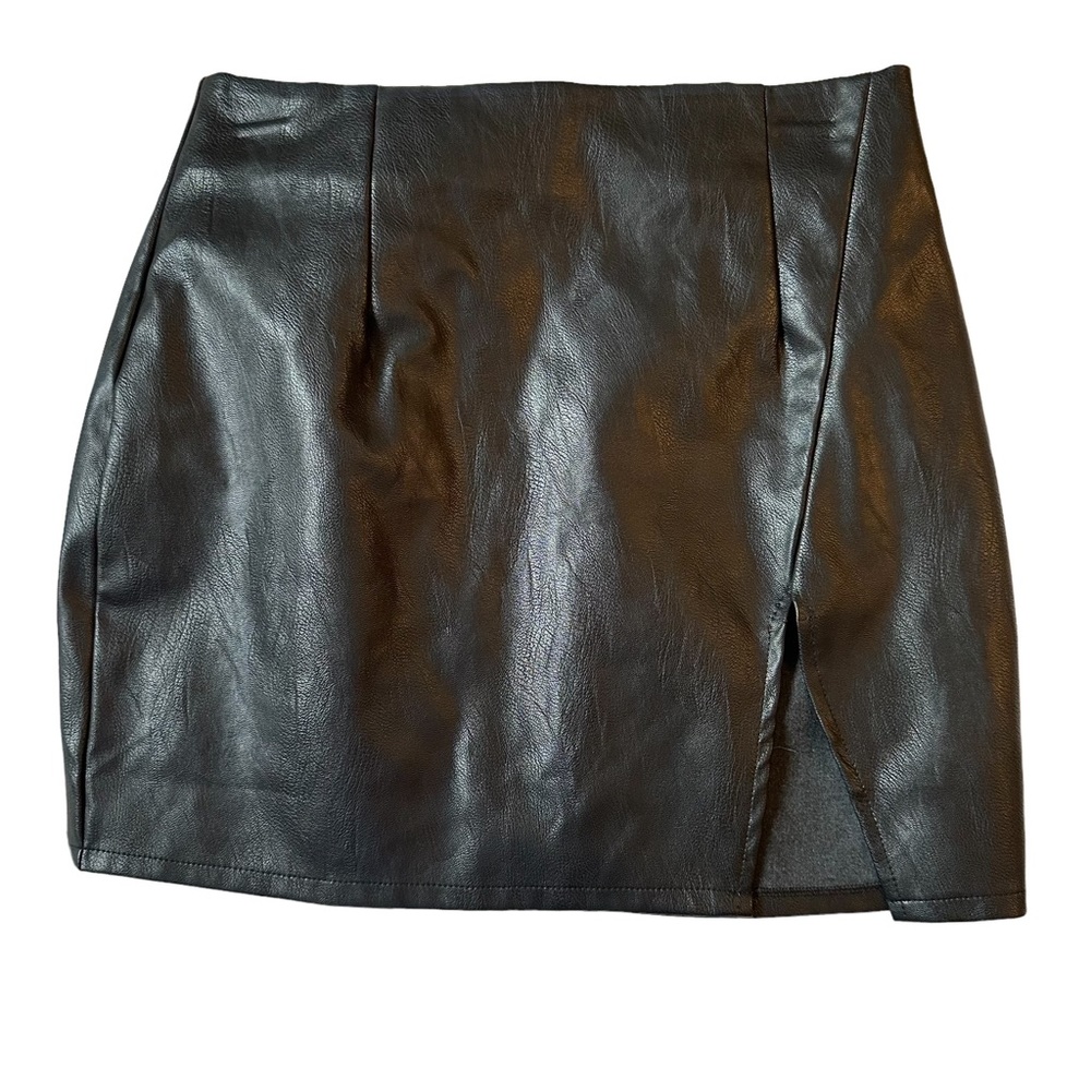 I.N.Studio black,faux leather mini skirt Slit in front real looking and feeling.